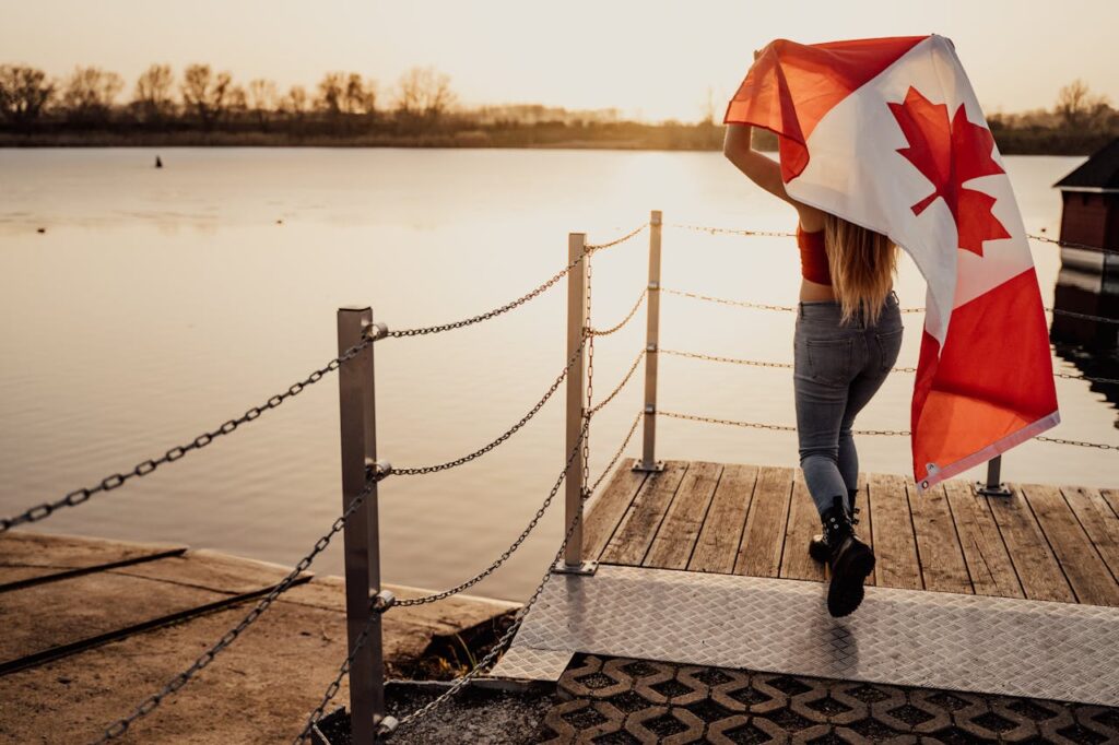 Girl holding flag of Canada