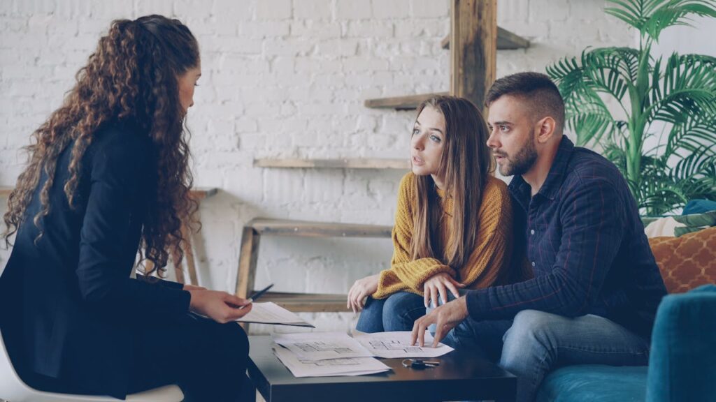 woman guiding clients about PR of Canada and Australia
